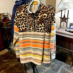 Large leopard print with strips on the bottom pull over by Now N Forever